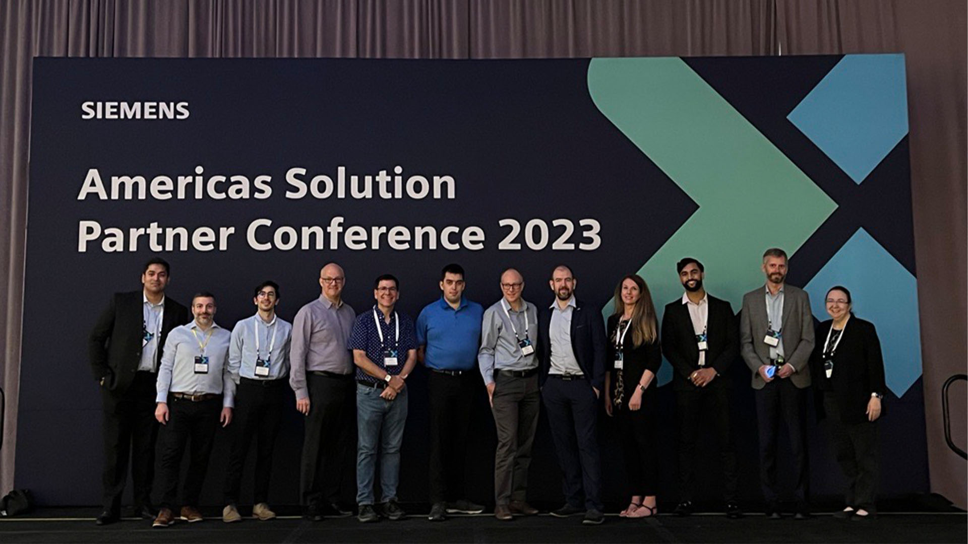 mayahtt-partner-conference Maya HTT employees at a Siemens 2023 partner conference