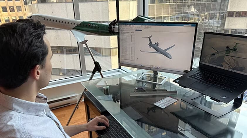 A Green Aerospace employee working on a CAE model.